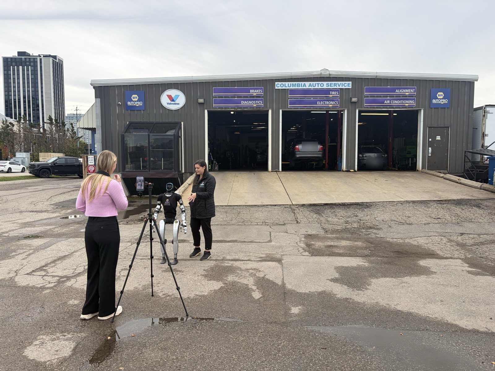 CBC Kitchener-Waterloo filming Cory outside Columbia Auto Group